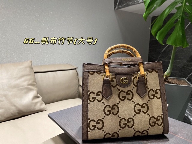 Gucci ladies canvas bag with bamboo joint handle middle